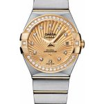 Omega Ladies Constellation Chronometer Watch – 27 mm Brushed Steel And Yellow Gold Case – Diamond Bezel – Champagne Supernova Diamond Dial – 123.25.27.20.58.001